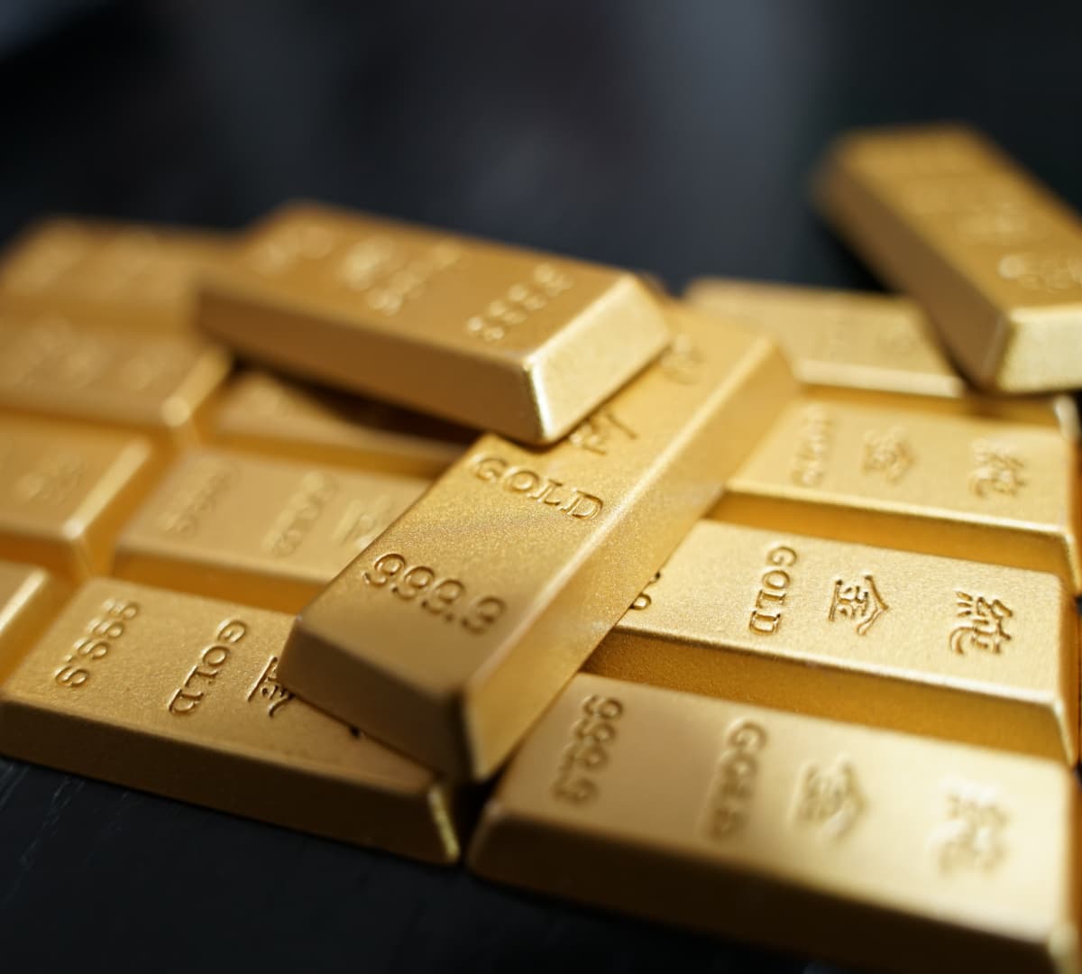 Gold hits over three-month high on dollar weakness, Treasury bond buyback plans