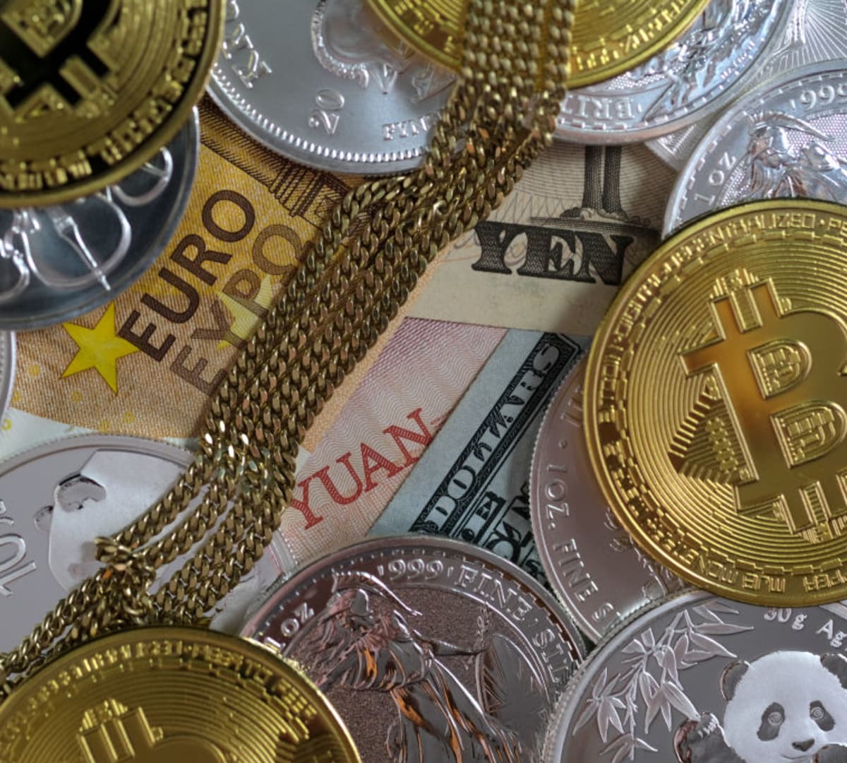 The 'debasement trade' returns after Bessent bond maneuver. Crypto and gold are back in style