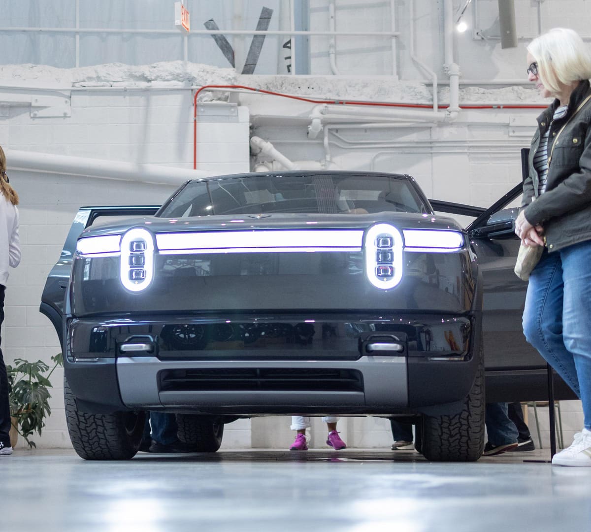 Rivian third-quarter earnings beat estimates as software revenue, R2 deliveries rise
